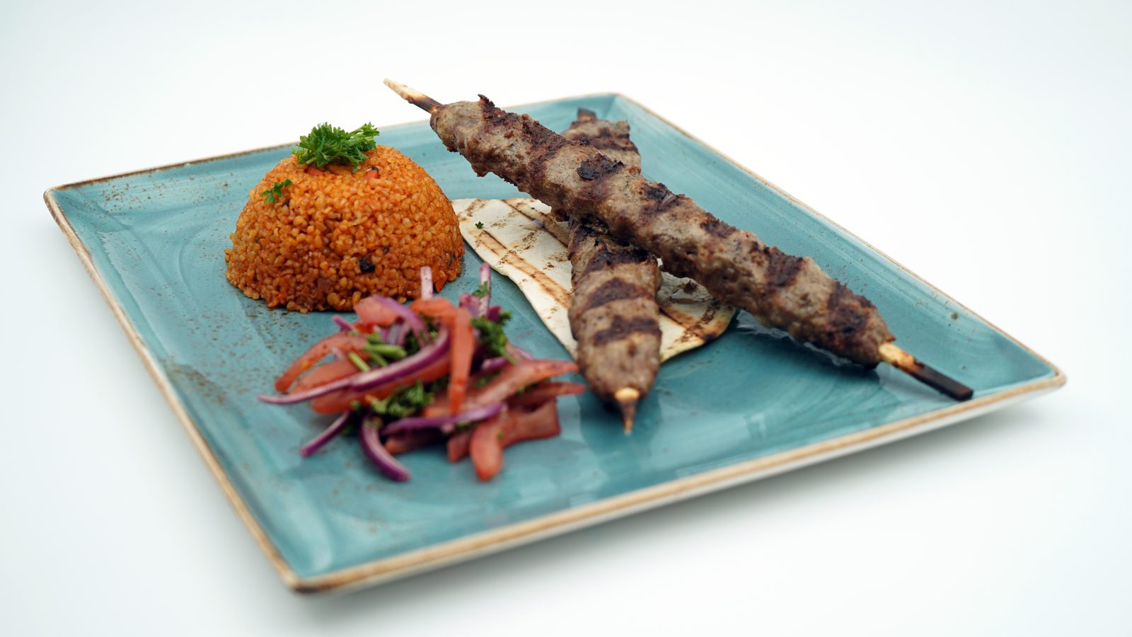 Kebap Löwenbräu with bulgur