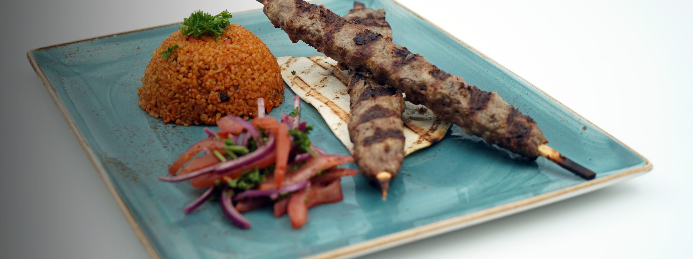 Kebap Löwenbräu with bulgur